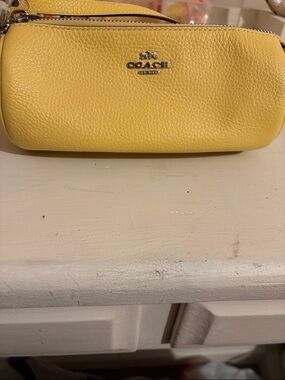 Coach Yellow Pebbled Leather Wristlet Clutch